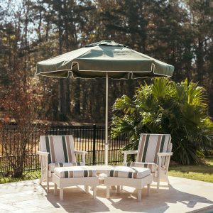 Bourbon Ultimate Package featuring two Bourbon chairs, two Bourbon ottomans, a Bourbon side table, and a Palmetto umbrella with round anchor base.