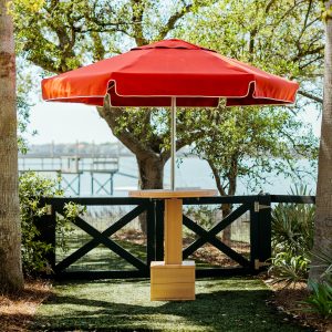 High Tide Table with no chairs attached to a Terracotta Palmetto umbrella. 