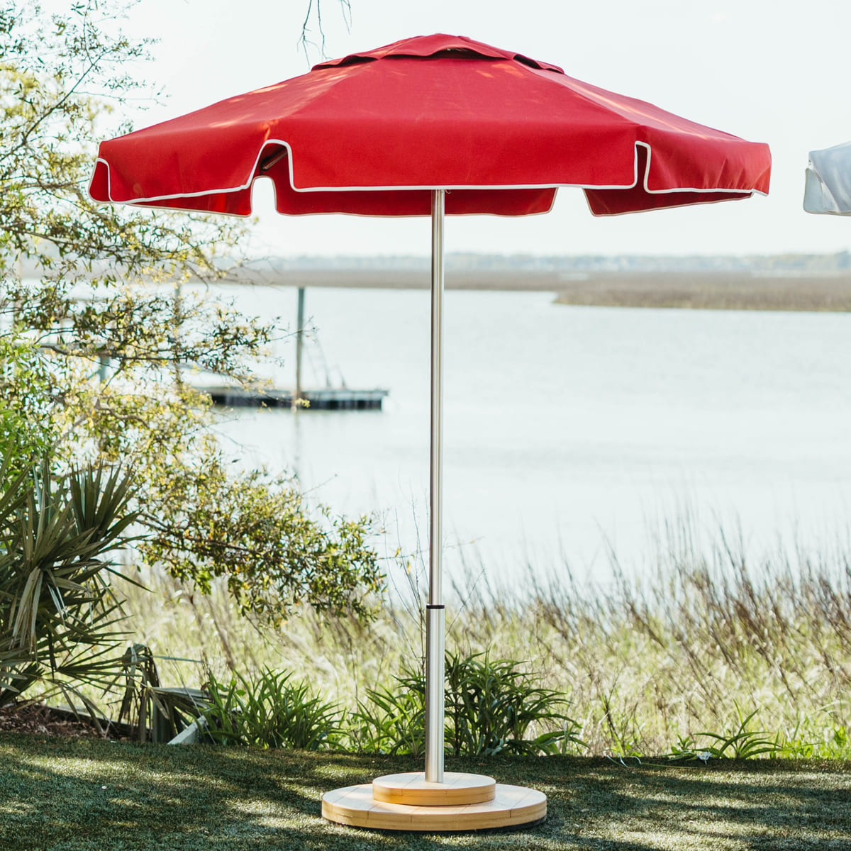 Red Palmetto Outdoor Umbrella in front of a Lowcountry marsh