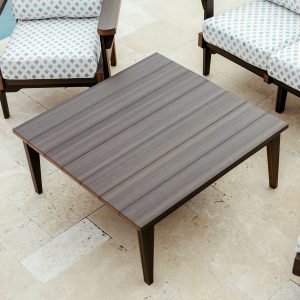 Top view of a Brazilian Walnut Sweetgrass Outdoor Coffee Table.