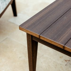 Closeup of a Brazilian Walnut Sweetgrass Outdoor Coffee Table.
